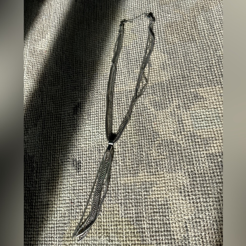 Multi-chain silver tassle necklace